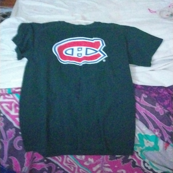 I'm am selling a black 14 /16 size black dress with a bow a hockey a green purse - Picture 2 of 5